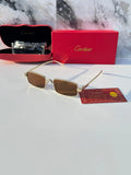 Gold rectangular sunglasses with brown lenses - flat lay with Cartier red box and authenticity card