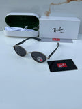 Ray-Ban x Ferrari RB8206 Silver Black - Hand holding frame showing silver oval rim with dark grey polarized lenses and Ray-Ban P logo