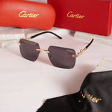 Rimless square gold black sunglasses - front view with Cartier red case and cleaning cloth