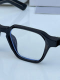 Ray-Ban RB1115 Black Plano - Front angled view showing geometric angular frame