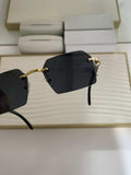 Dark smoke rimless square sunglasses - temple and hinge detail