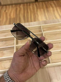 Gunmetal navigator sunglasses - side profile showing slim black temples