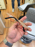 Prada Rose Gold Aviator Sunglasses - Folded Side View with Blade Temples
