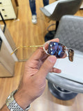 Prada Luxe Rimless Sunglasses Gold Brown - Side Temple View