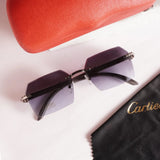 Rimless diamond-cut sunglasses - top flat lay view with Cartier cleaning cloth