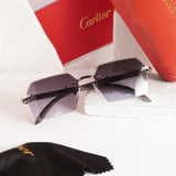 Rimless diamond-cut sunglasses - side angle showing slim dark grey temples and gradient lenses